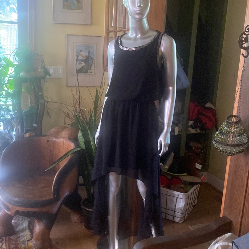 Gorgeous Forever 21 dress  multi layer . Metal around arms and neck